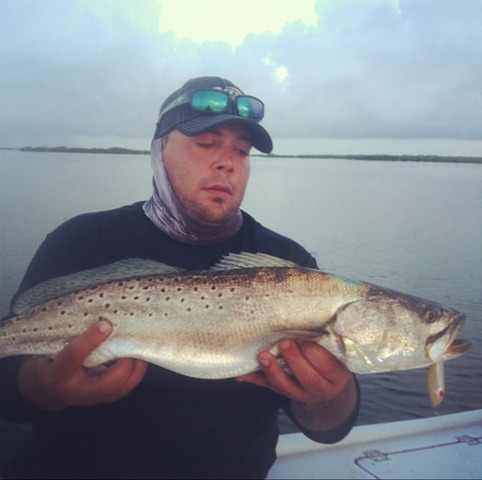 Captin Craig displays a spotted sea trout.